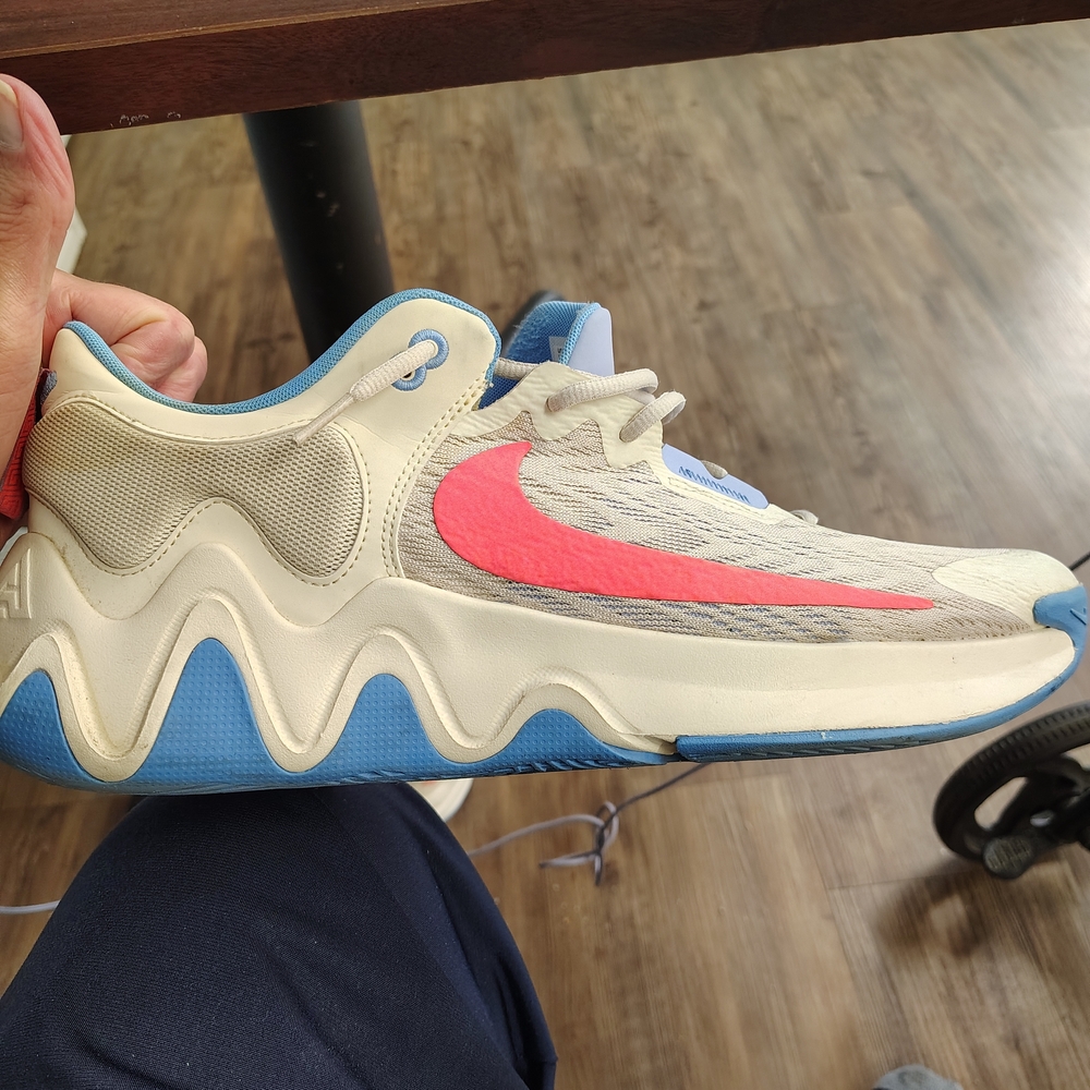 Nike Men's Sneakers with Pink Swoosh and Blue Sole